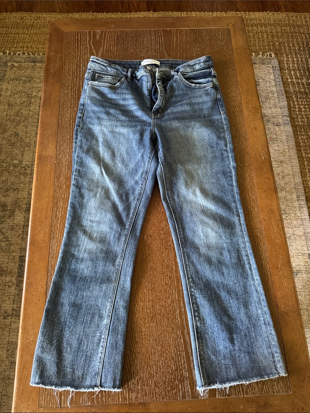High-Rise Light Blue Flare Jeans with Raw Hem